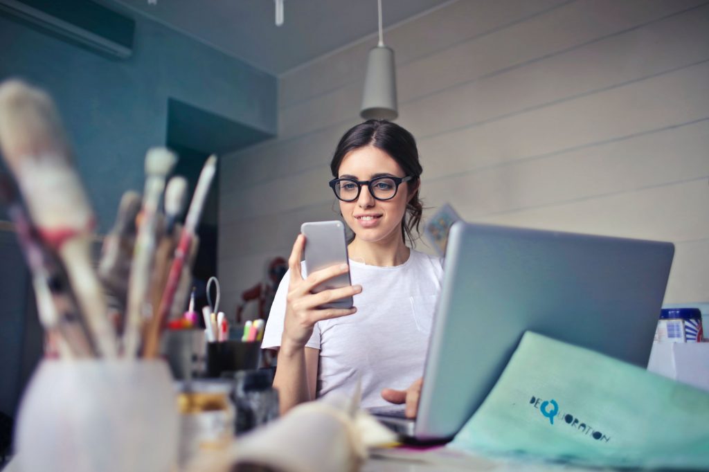 woman on her laptop working remotely from home