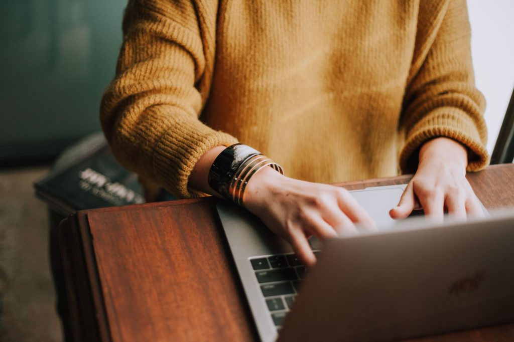 woman on her laptop working from home