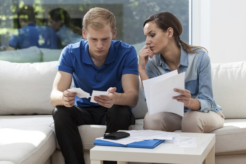 Two people analyzing finances for year-end planning